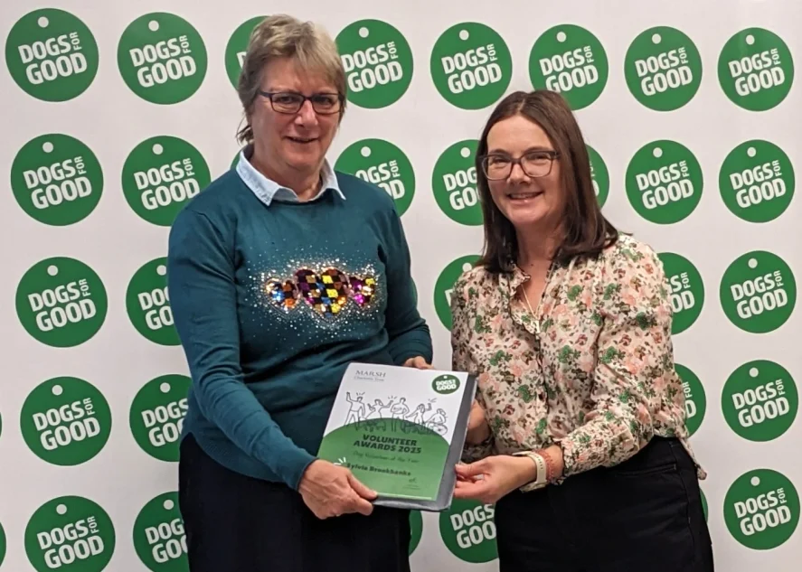 Volunteer Sylvia Brookbanks being handed award by our Trustee Ruth Goddard