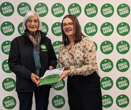 Volunteer Anna Prosser being handed award by our Trustee Ruth Goddard