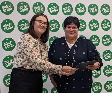 Volunteer Julie Messer being handed award by our Trustee Ruth Goddard