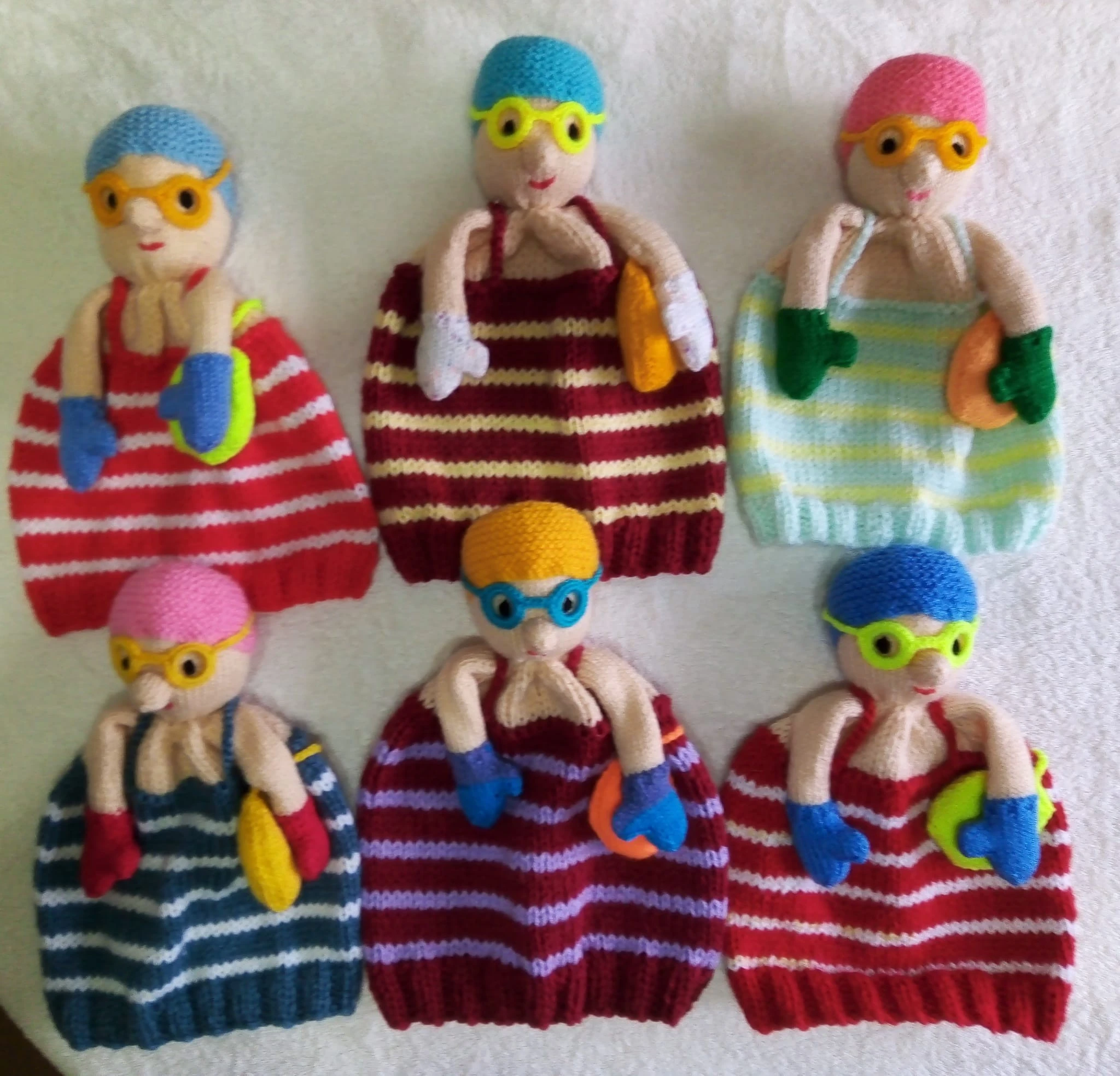 Hats With Knitted Cold Water Swimmers Attached To Top