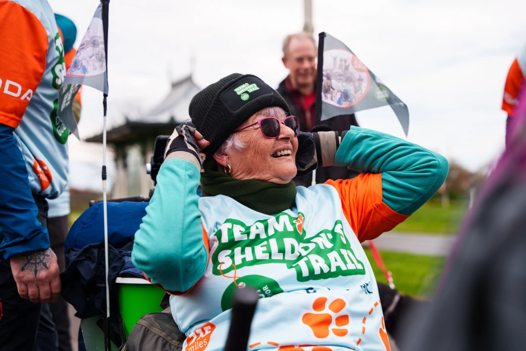 Mary Sitting Wheelchair Outside Laughing Smiling Frontfacing