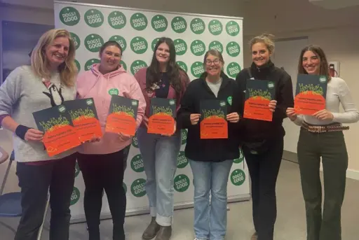 Winners of the Dogs for Good People Awards 2025 standing together holding certificates